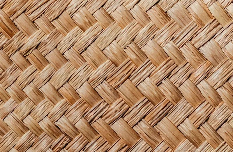 Close detail of a pale hand-woven mat